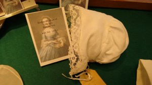 Repro cap, gathered and displayed stuffed with paper to show shape. 