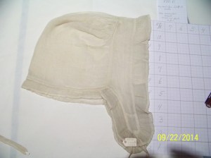 18th C lappet cap from the Smithsonian, laid flat. 