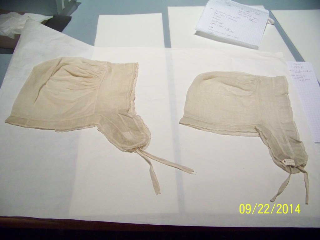 Two 18th C caps side-by-side from the Smithsonian.