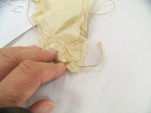 Tip of the lappet showing string attached. 