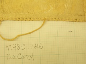 Cap McCord Museum #M980.4.26 photo by author.. Close up inside of bottom edge of lace headpiece. 